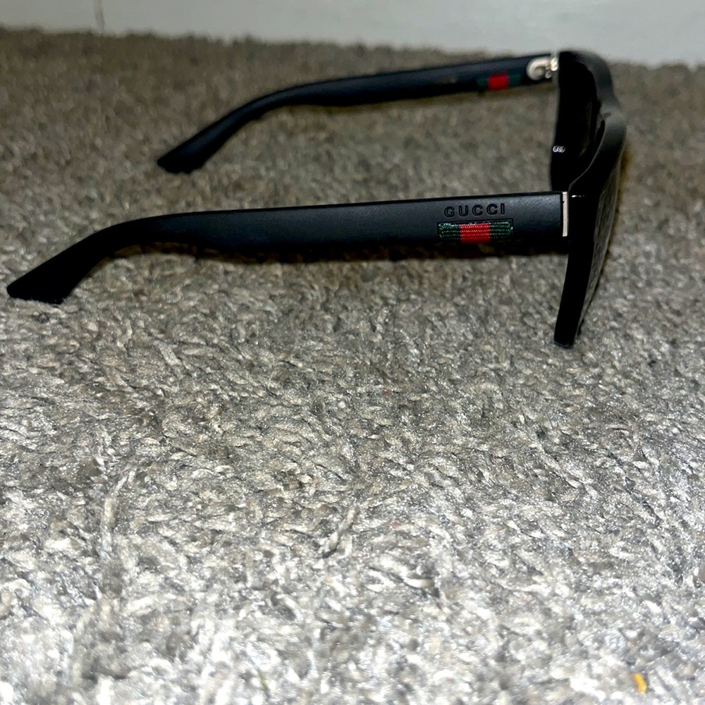 Black Gucci GG0010s sunglasses
